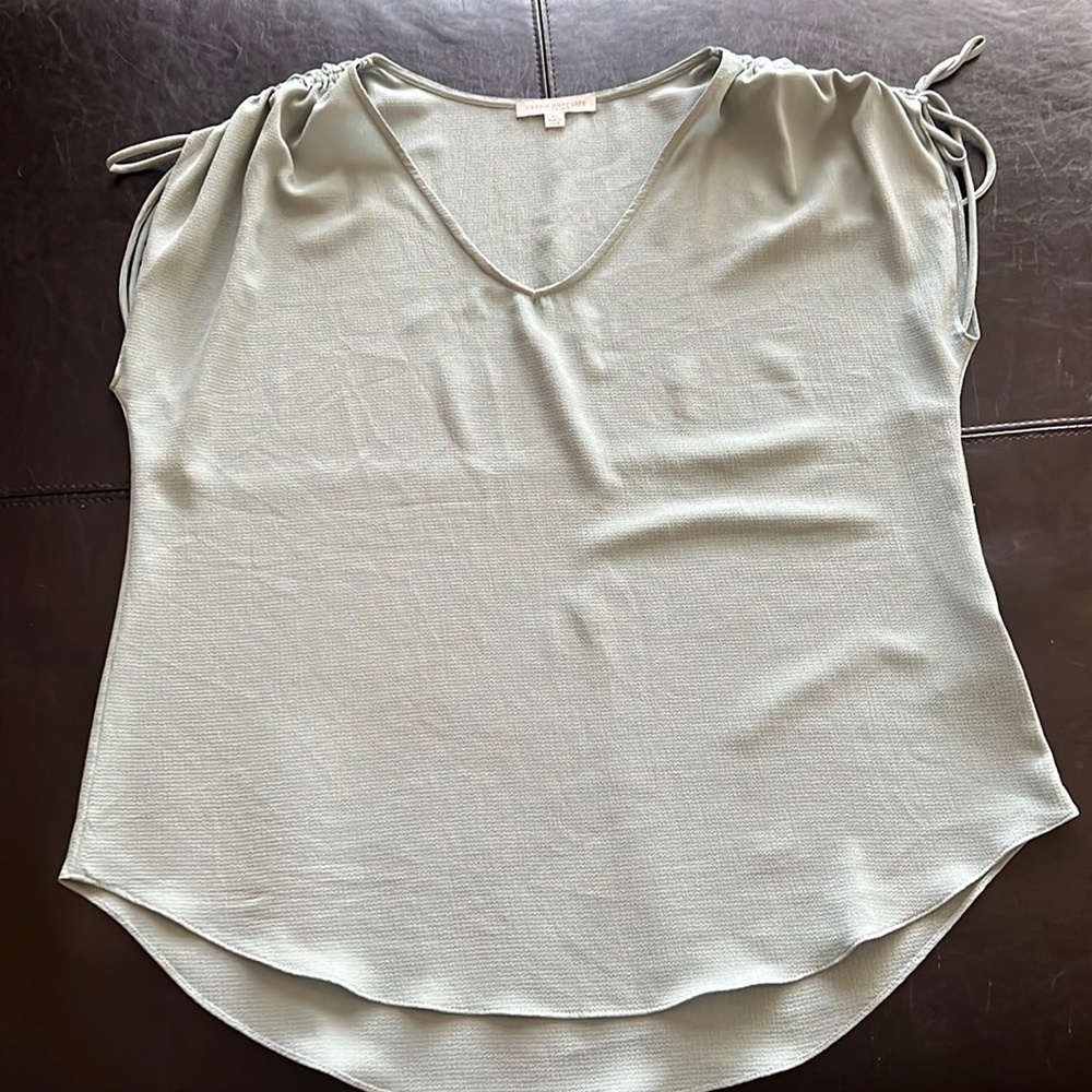 Mint green blouse. Size is XL but runs like a Large